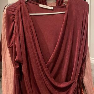 Burgundy pretty cross shirt 
Just the right amount of shine!